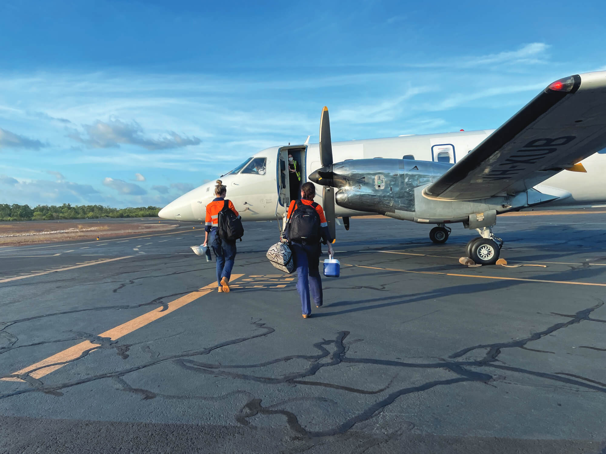 Workers boarding a plane